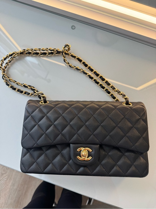 CHANEL Handbags - CHANEL Black Quilted Shoulder Bag with Gold Hardware